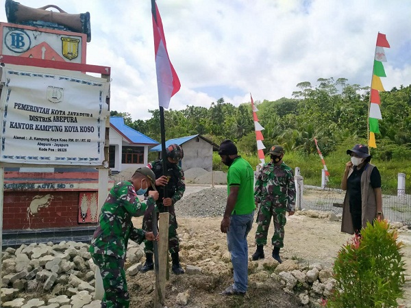 Sambut HUT Kemerdekaan RI, TNI dengan Warga Merah Putih - kan Papua