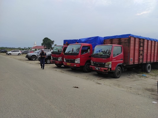 Ditreskrimsus Poldasu Amankan 8 Truk Bawa Barang Asal Malaysia Tanpa Dokumen